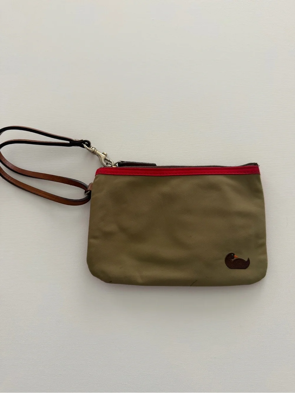 Dooney & Bourke Tan and Red Wristlet with pink interior and Brown Strap